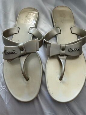 Coach Women’s Bow Toe-Post Sandals in Light Silver